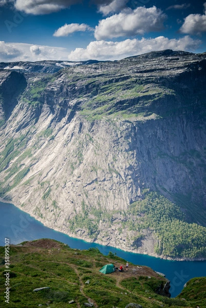 Fototapeta panorama of the fjord in Norway. view of the fjord. Two rocks over a cliff. Mountain lake and stone cliffs. Norwegian view from the mountain
