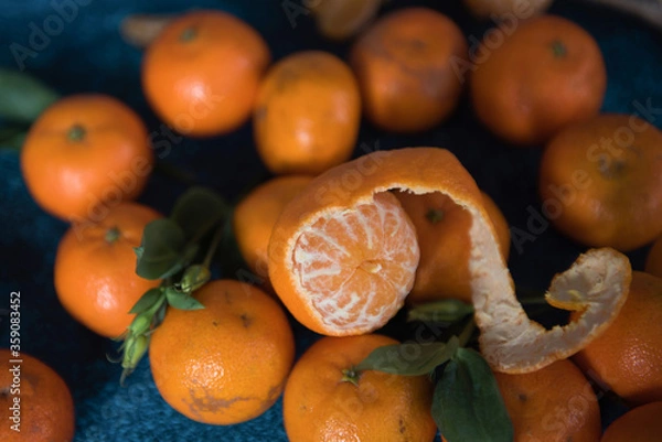 Obraz tangerines on blue  table