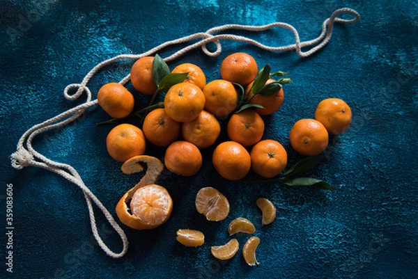Obraz tangerines on blue background 