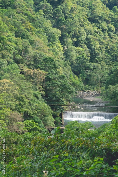 Obraz Small waterfall and bridge in the forest