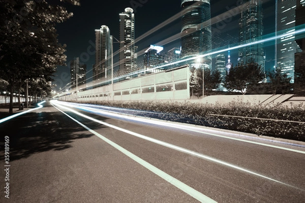 Obraz Empty road surface with city landmark buildings of night