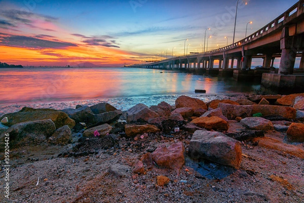 Fototapeta Beautiful landscape view during sunrise from Penang bridge. Soft focus effect due to long exposure technique