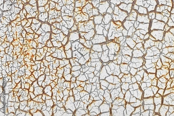 Obraz White cracked paint is applied to a rusty surface