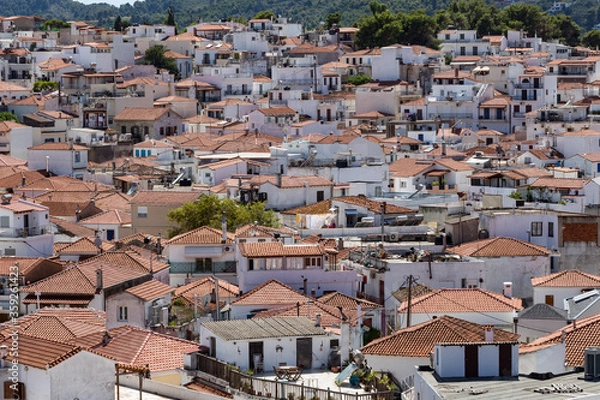 Fototapeta Panorama view over Skiathos town and its port, Skiathos island, Sporades, Greece. Island is a popular tourist destination for both local and foreign tourists.