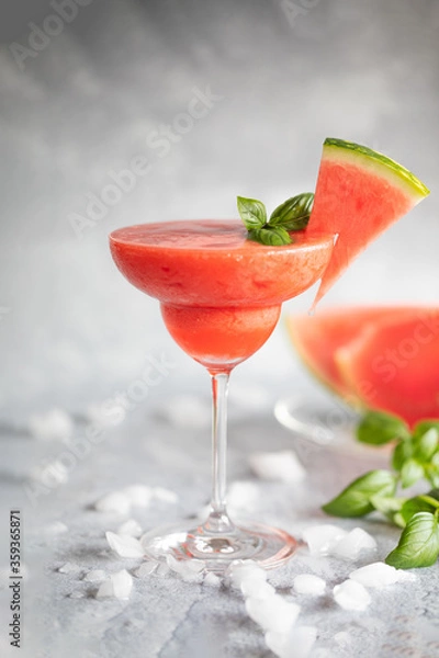 Obraz A frozen red drink garnished with watermelon and basil
