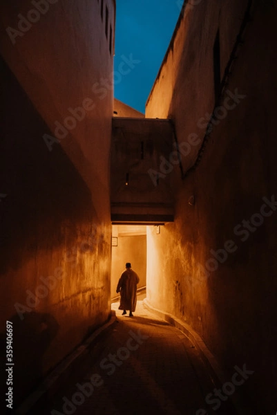 Obraz Night view of the old streets in the Fes Medina quarter in Northern Morocco. A medina is typically walled, with many narrow and maze-like streets.