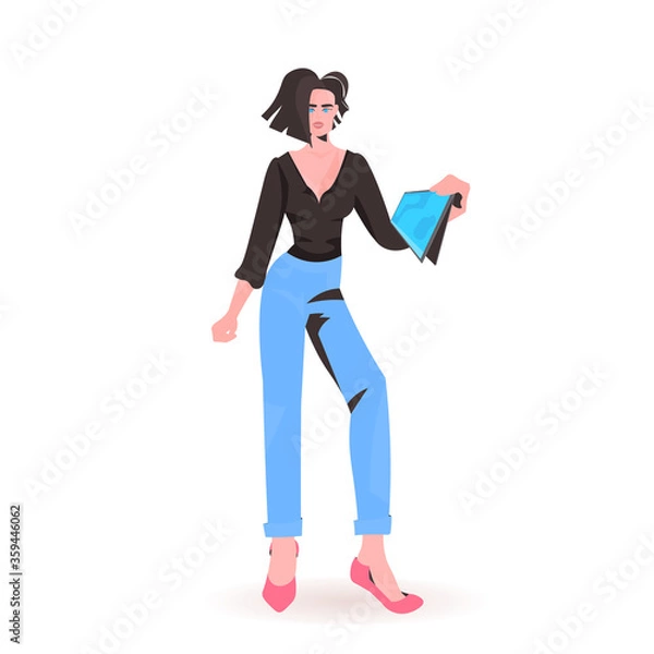 Fototapeta woman holding tablet pc beautiful girl model in trendy clothes female cartoon character standing pose full length isolated vector illustration