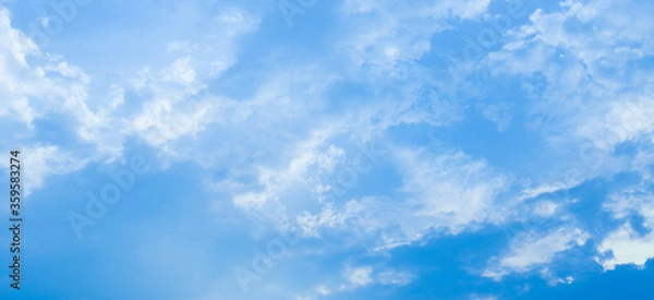 Obraz blue sky background with tiny clouds. panorama