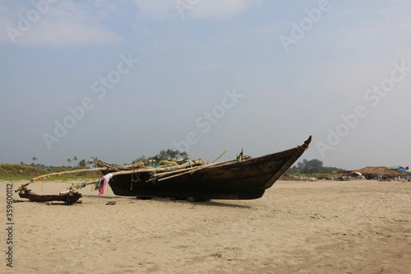 Obraz wooden boat on the beach of Goa