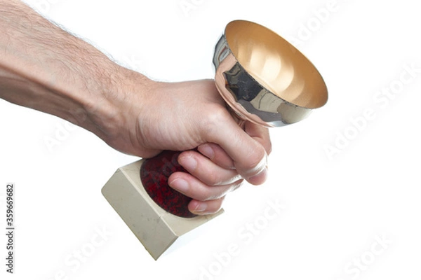 Obraz Man hand holding a trophy