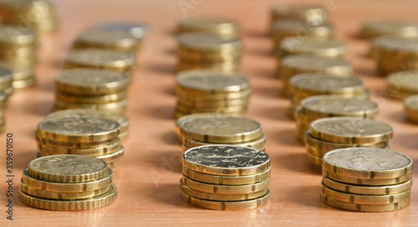 Fototapeta prospective view of coins in column
