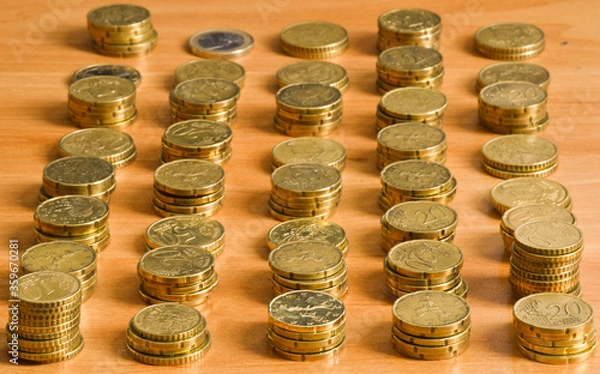 Fototapeta prospective view of coins in column