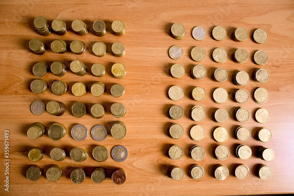 Fototapeta top view of coins in column