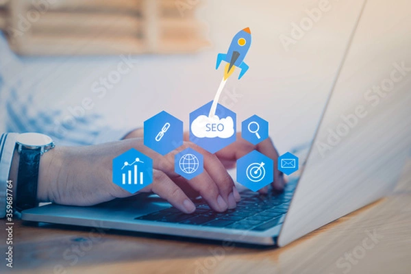 Obraz SEO Search Engine Optimization concept with laptop computer. ranking traffic on website