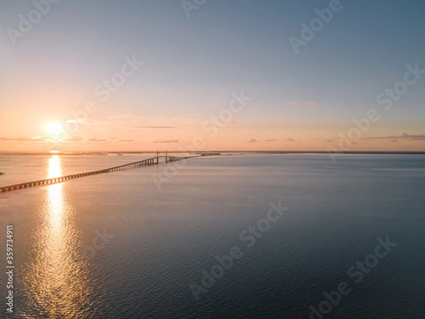 Fototapeta View of the sunshine skyway bridge during sunset