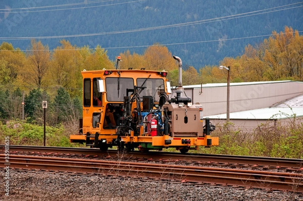 Obraz Machinery Work on Railroad Tracks