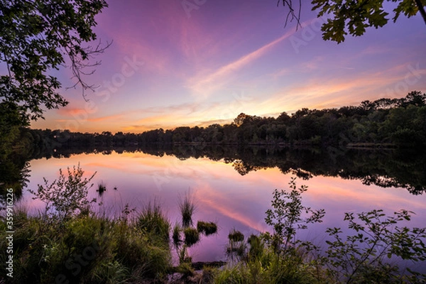 Fototapeta Coucher de soleil sur le lac d'hostens reflet couleurs 