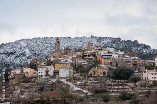Fototapeta Postcard of the medieval town of Capafonts (in Catalonia, Spain) full of snow