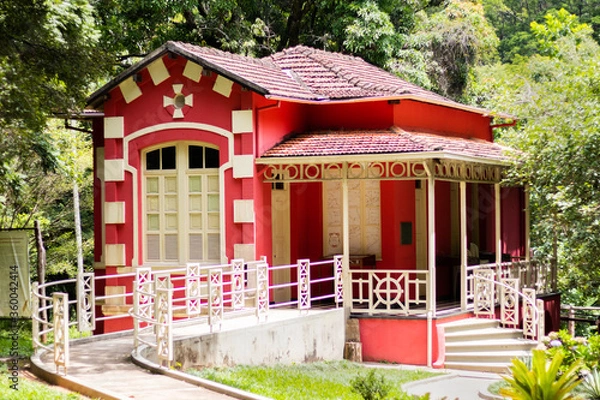 Fototapeta red house in the woods