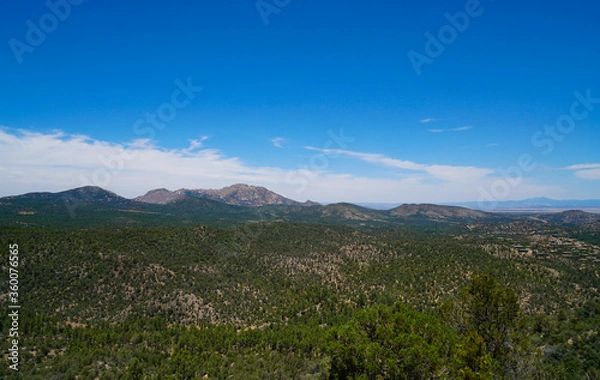 Fototapeta The views from the top of the trail on Prescott, Arizona's Thumb Butte. In the distance you can see Granite Mountain, and the San Francisco Peaks.