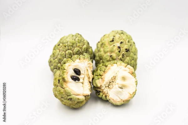 Obraz Four custard apples placed on a white ground.