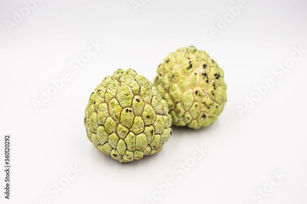 Obraz Two custard apples placed on a white ground.
