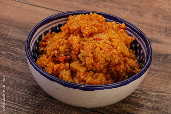 Fototapeta Couscos with tomato and chicken