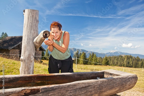 Fototapeta Enjoying fresh mountain water