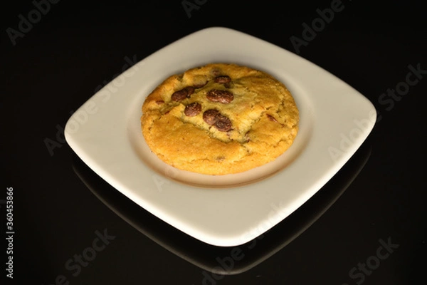 Fototapeta Homemade cookies with chocolate, close-up, on a white background.