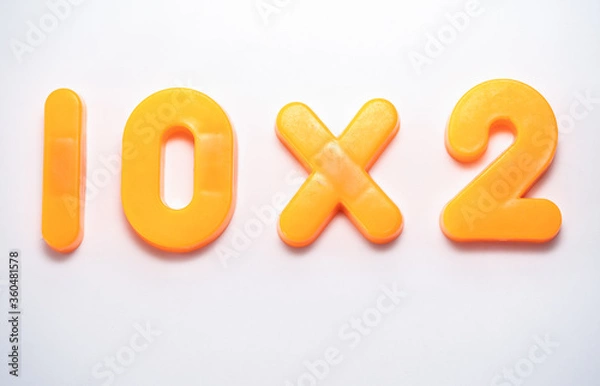 Fototapeta Simple math equations with orange numbers on a white background