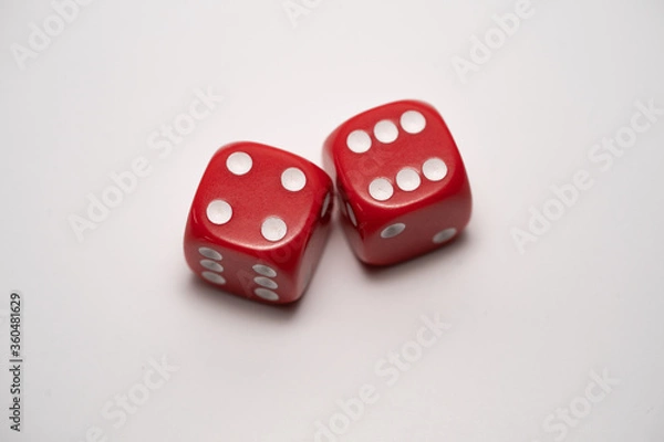 Fototapeta red dice on a white background from above
