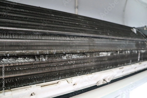 Fototapeta the process of clean and wash the air condition with the high pressure electric pump in the bedroom during hot summer