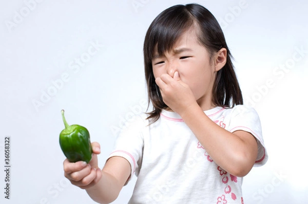 Obraz ピーマンを持つ女の子
