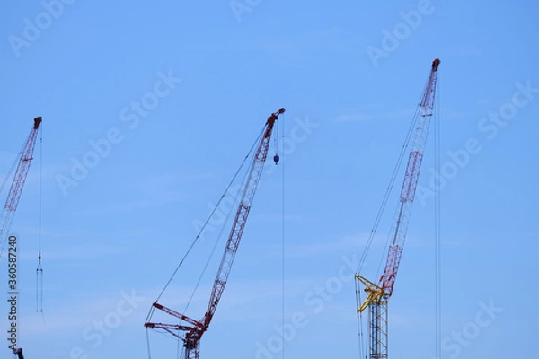 Fototapeta 街を支える力強いクレーン