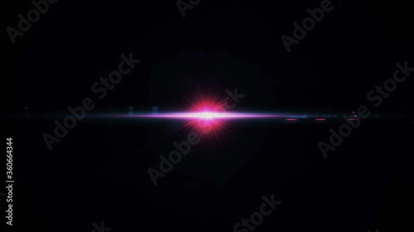 Fototapeta Anamorphic lens flare from a photo camera lens. Anamorphic background.