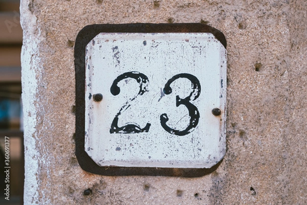 Obraz number one on a wall