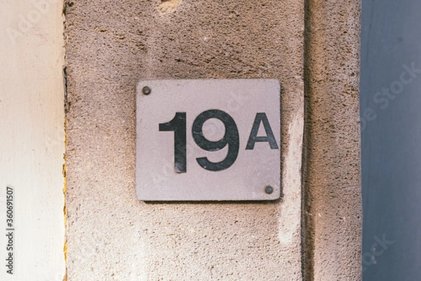 Obraz number nineteen on a wall