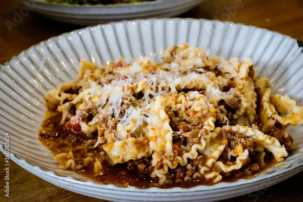 Fototapeta Reginette pasta with pork Bolognese sauce