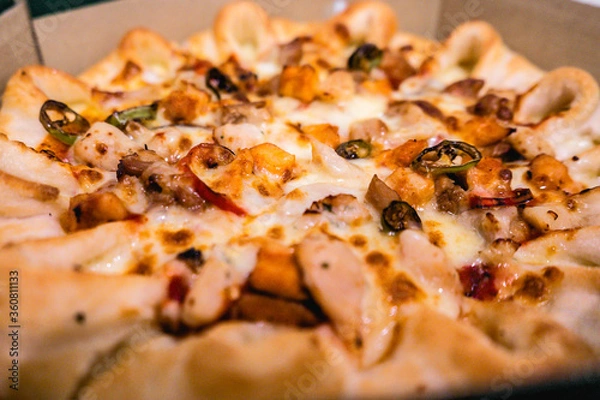 Fototapeta delicious slice pizza , food delivery work from home in Covid-19