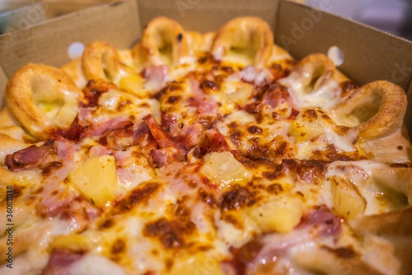 Fototapeta delicious slice pizza , food delivery work from home in Covid-19