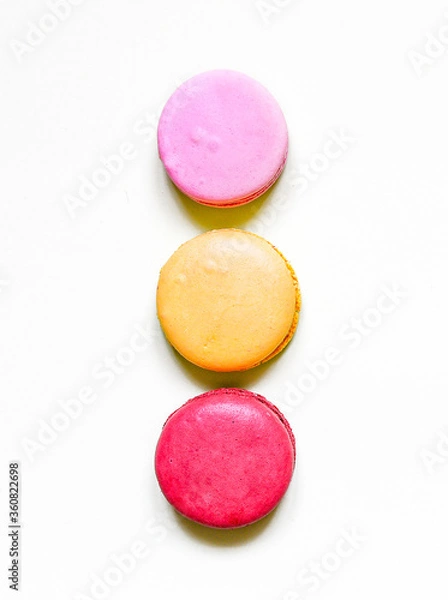 Fototapeta Colorful macarons on white background.
