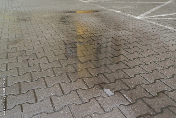 Obraz woda na kostce brukowej 