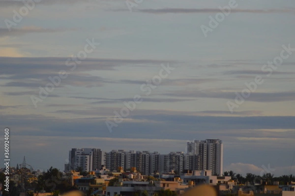 Fototapeta Time lapse clouds over the city