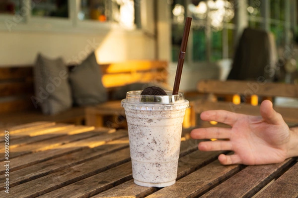 Fototapeta Milkshake with ice cream and oreo cookies. Cool and refreshing on a hot day