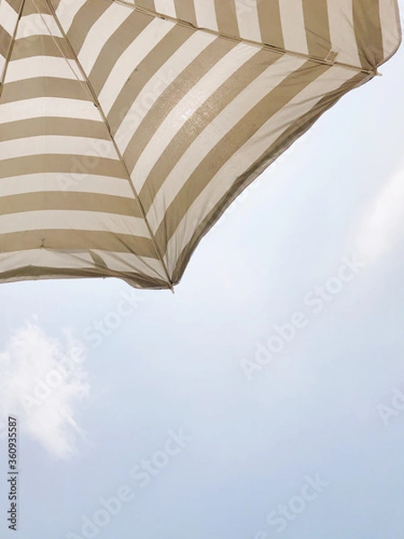 Obraz beach umbrella and blue sky