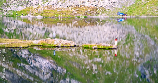 Obraz A beautiful landscape with the Balea lake. Transfagarasan Road. Island and the calm water of the lake.