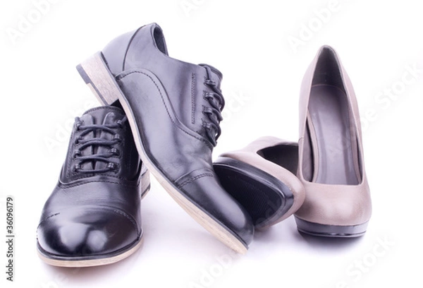 Fototapeta A pair of men's and women's shoes, isolated