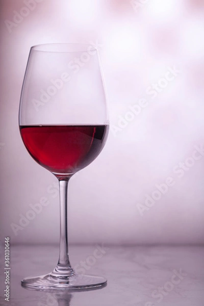 Obraz glass of red wine on blurred background