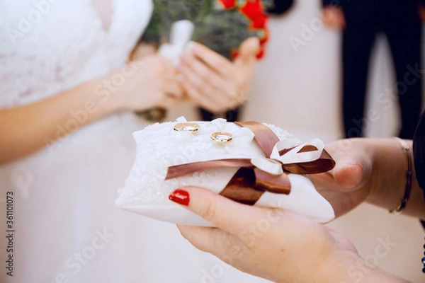 Fototapeta two rings on a wedding pillow