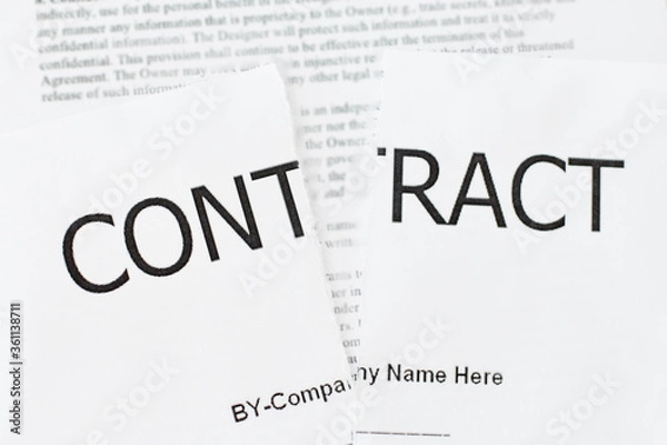 Fototapeta Torn up contract on white text background